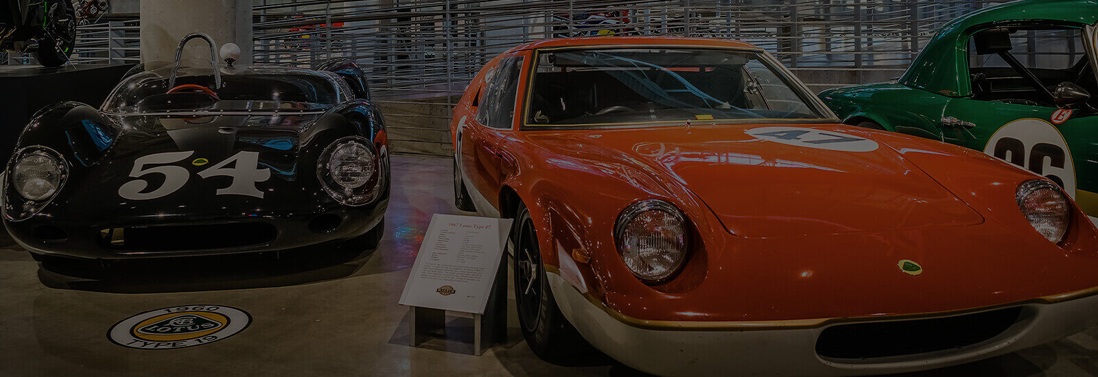 Showroom with vintage restored cars on display